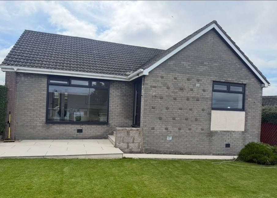 Bungalow exterior before roughcast renovation